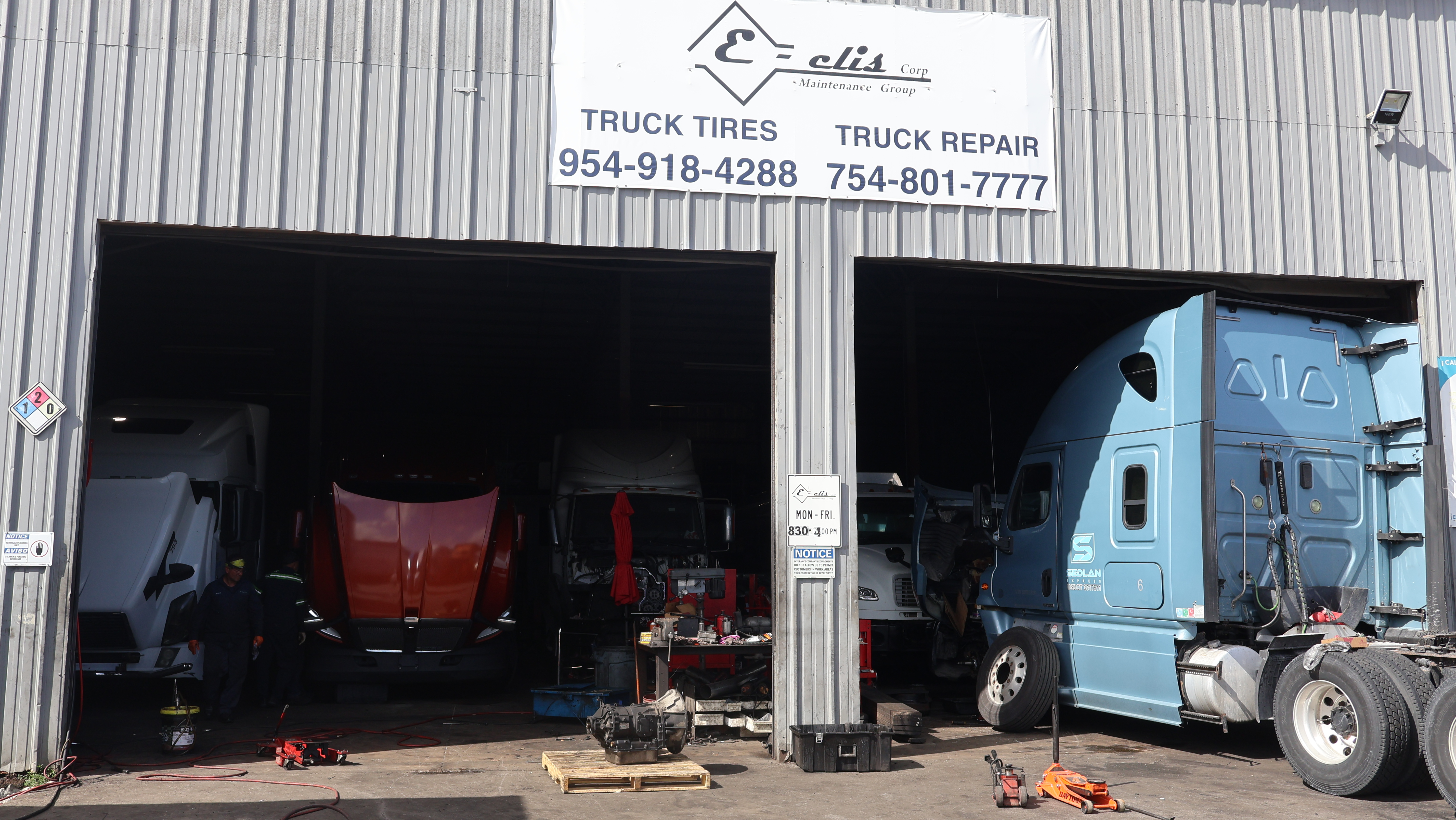 Elis Fleet Solutions shop with trucks in service bays, Pompano Beach FL